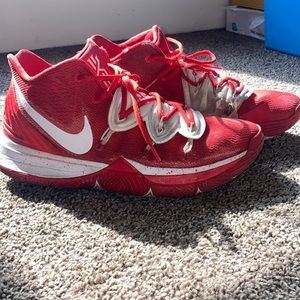 Size 12 red and white Mens Kyries by Nike